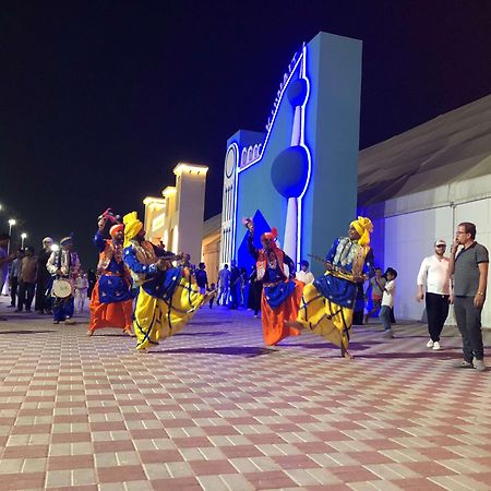 Radisson Blu Hotel, Ajman Exterior photo Bhangra dancers at the Global Village