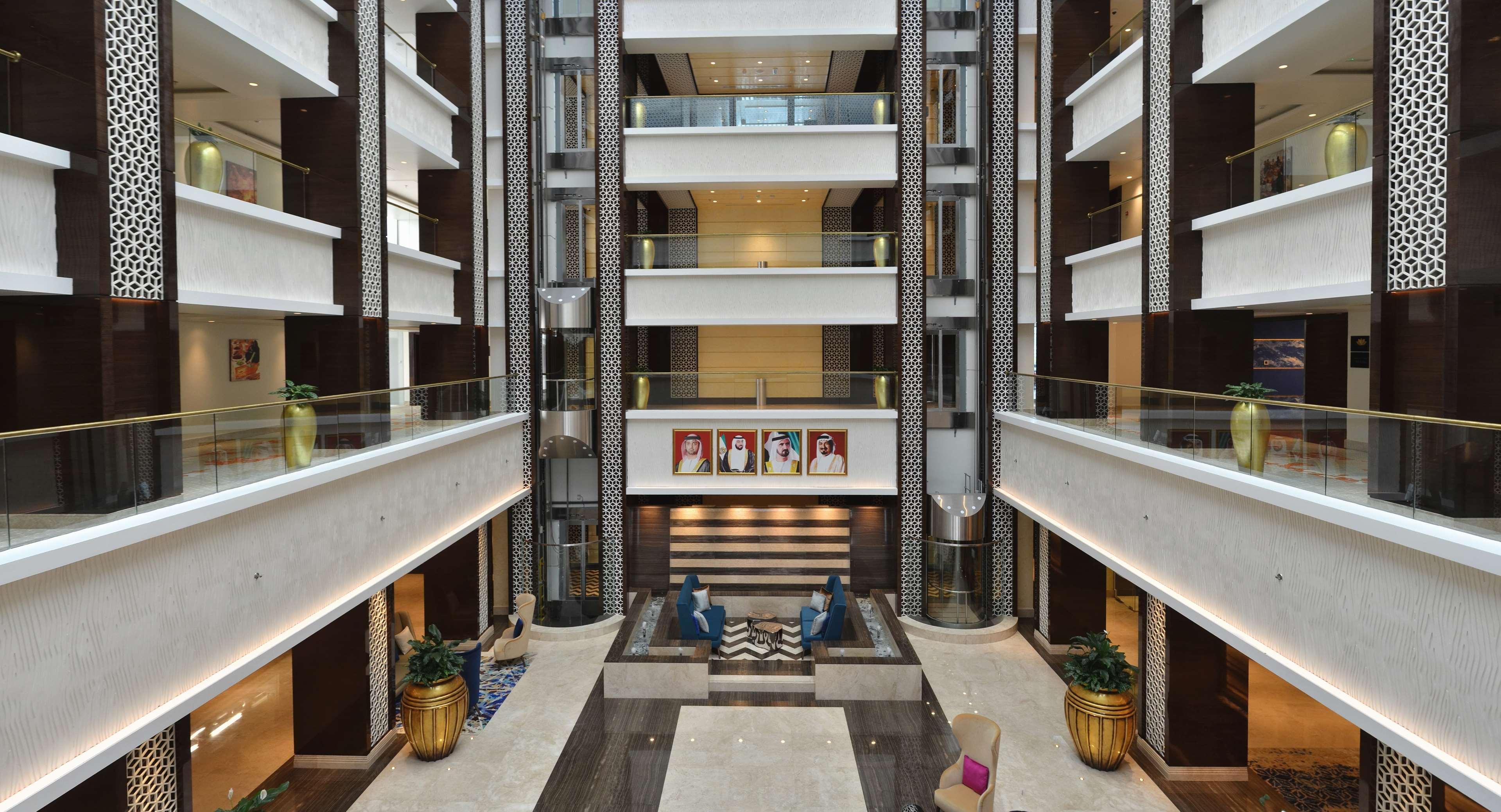 Radisson Blu Hotel, Ajman Exterior photo The Atrium