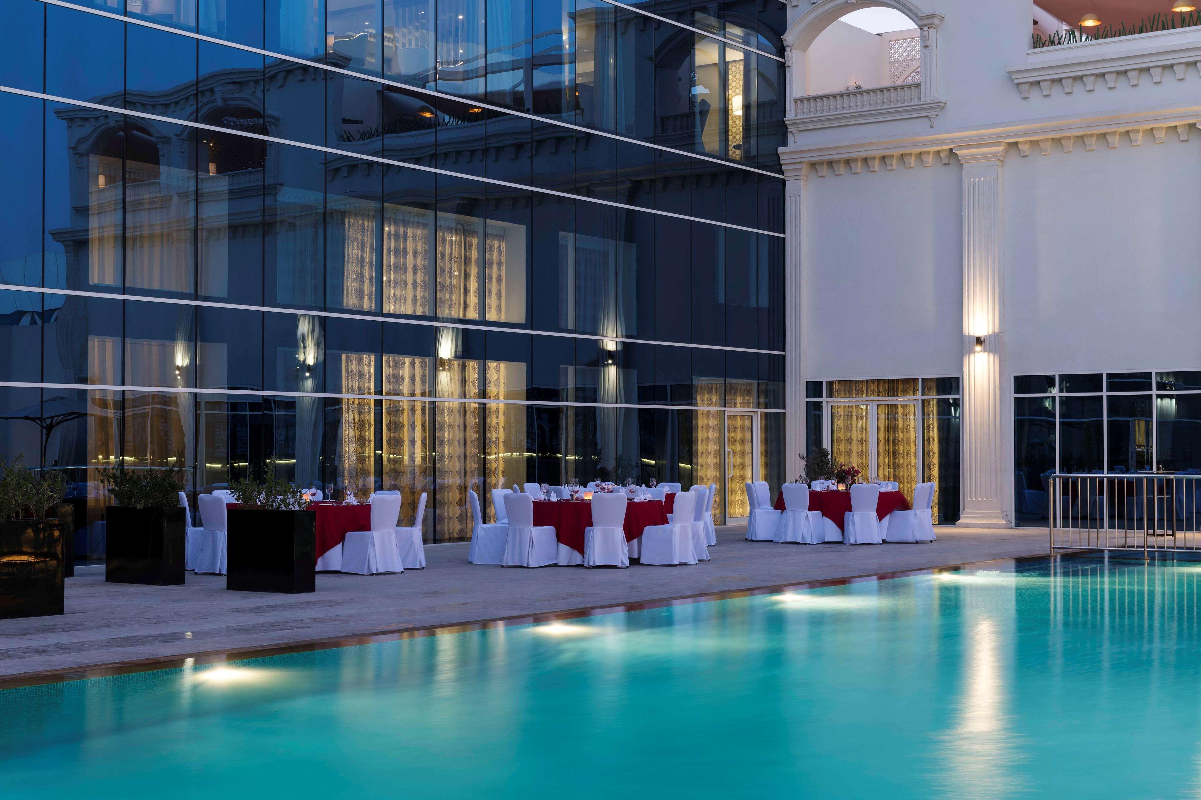 Radisson Blu Hotel, Ajman Exterior photo The pool at the hotel